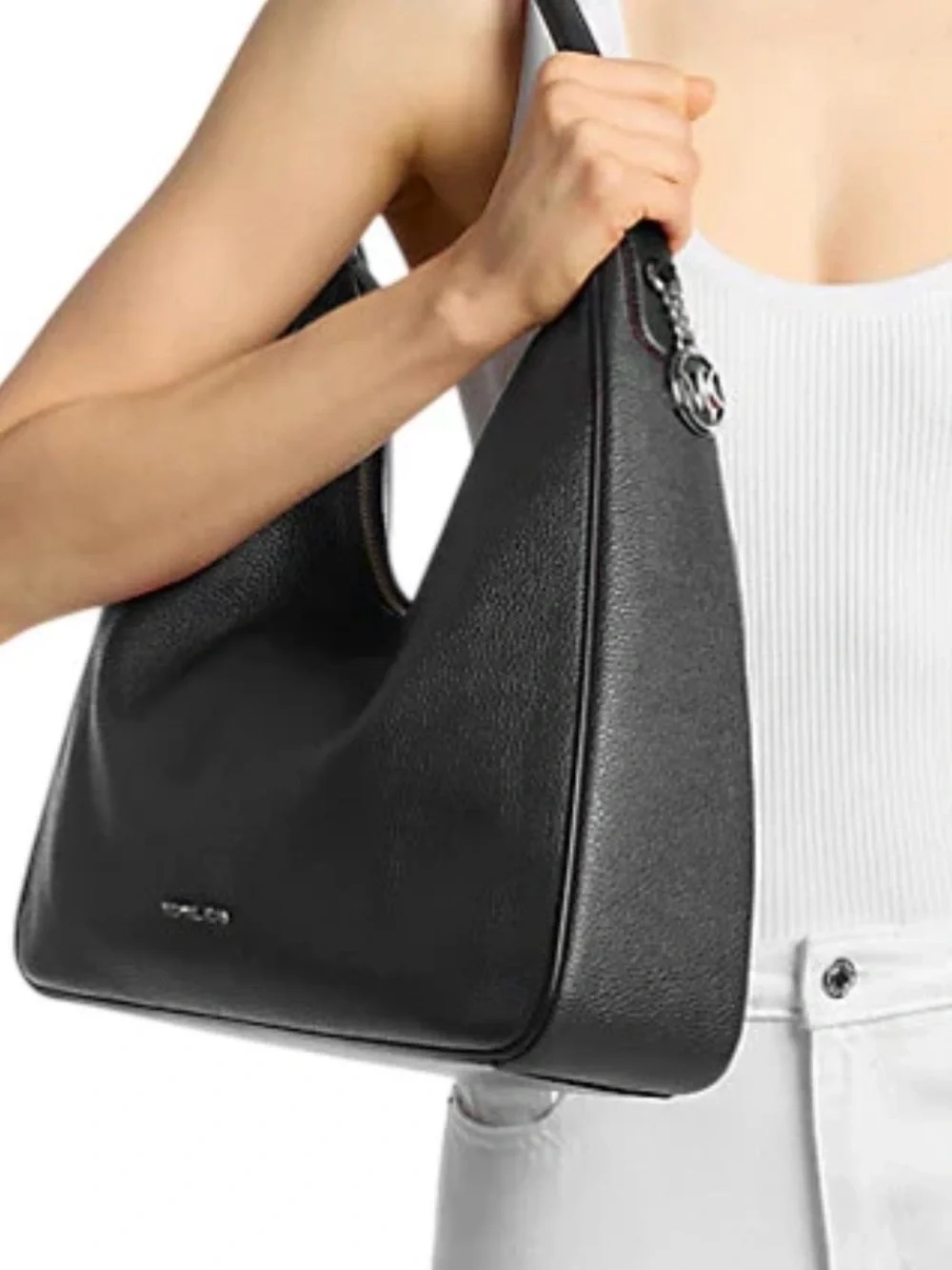 Michael Kors it features